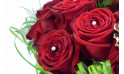 image de deux roses rouges du Bouquet de roses pour Noël Alhambra | Entrefleuristes
